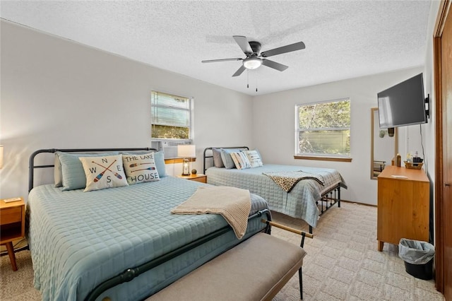 20766 Whispering Hills Rd, Garfield, AR 72732 - bedroom featuring a textured ceiling, ceiling fan, light carpet, and multiple windows