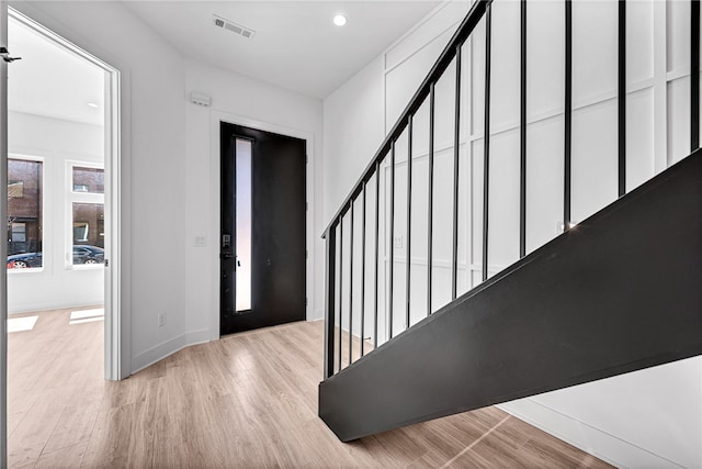 entrance foyer featuring light hardwood / wood-style floors