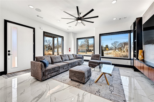 living room with ceiling fan