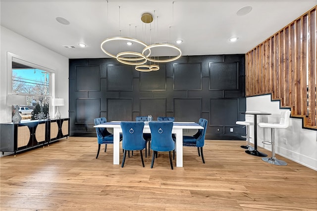 dining room featuring light hardwood / wood-style flooring