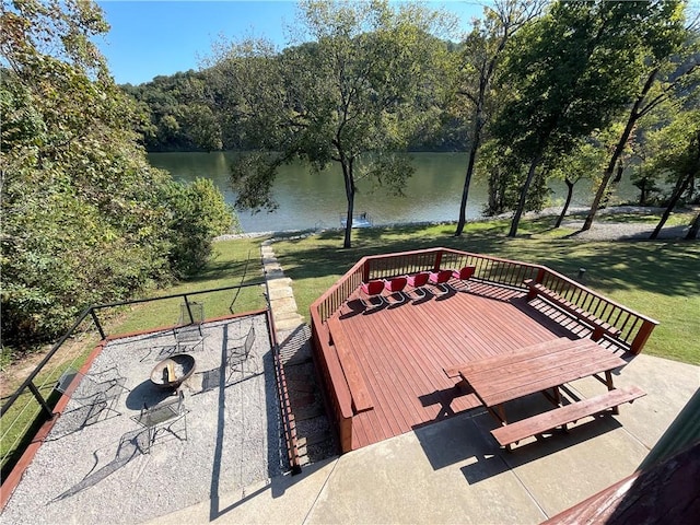 471 Mcphearson Ter, Calico Rock, AR 72519 - wooden deck with a water view, outdoor dining space, and a lawn