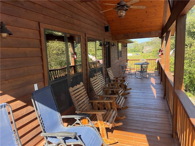 wooden deck with ceiling fan