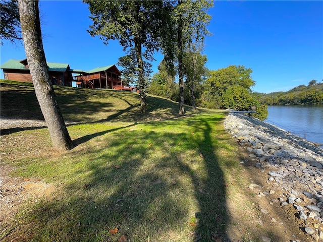 view of yard with a water view