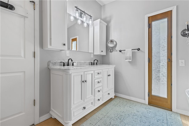 bathroom featuring vanity and tile patterned floors