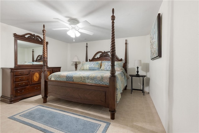 tiled bedroom with ceiling fan