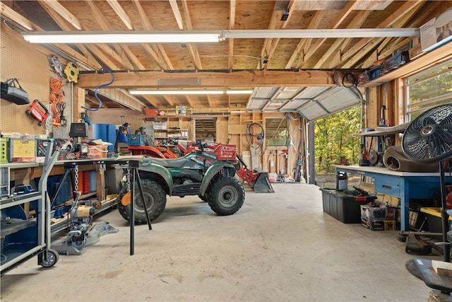 garage featuring a workshop area