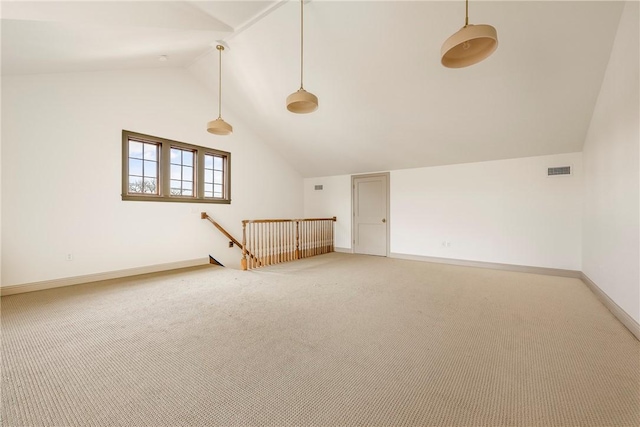 bonus room featuring carpet flooring and lofted ceiling