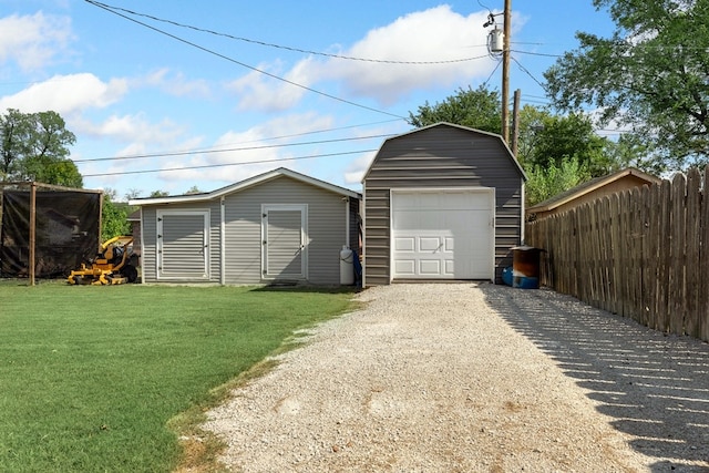 garage with a lawn