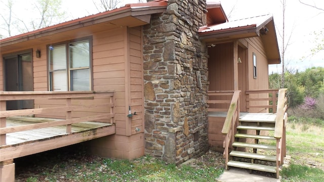 view of home's exterior with a wooden deck