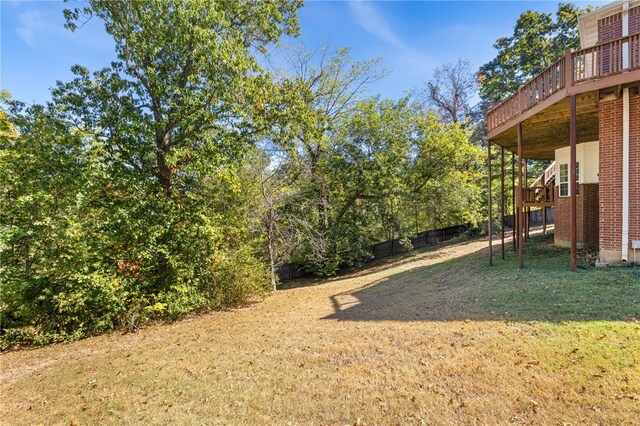 view of yard with a wooden deck