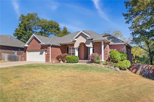 view of front facade featuring a garage and a front lawn