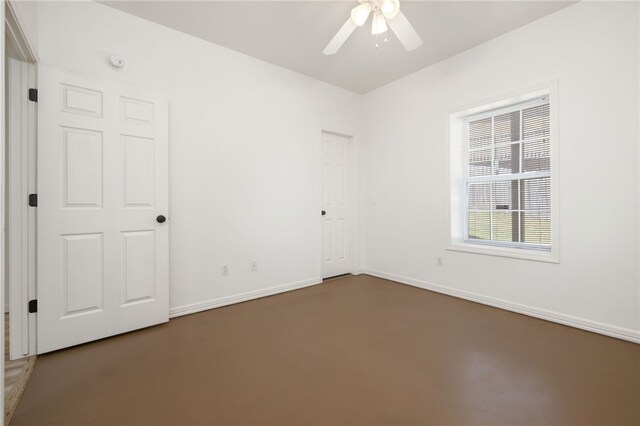 empty room with ceiling fan