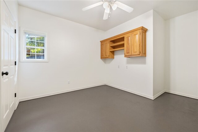 empty room featuring ceiling fan