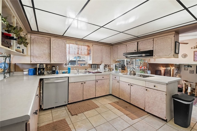 kitchen featuring sink, dishwasher, kitchen peninsula, light tile patterned floors, and black electric stovetop