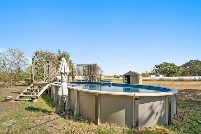 view of pool with a storage shed