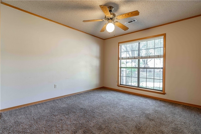 carpeted empty room with ceiling fan, a textured ceiling, and crown molding