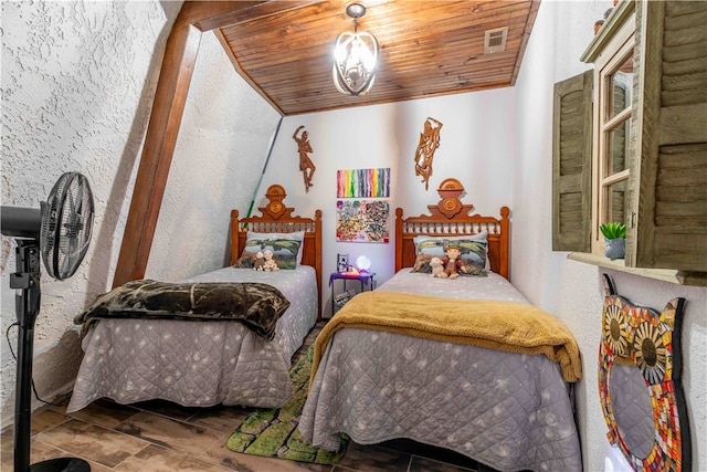 bedroom featuring wood ceiling