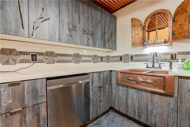 kitchen with stainless steel dishwasher, wood ceiling, and decorative backsplash