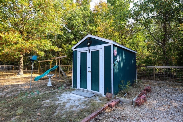 view of outdoor structure featuring a playground