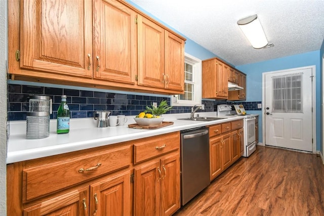 1 Hartlepool Dr, Bella Vista, AR 72715 - kitchen with stainless steel dishwasher, dark wood-type flooring, white range with electric stovetop, light countertops, and a sink