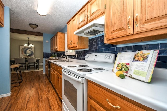 1 Hartlepool Dr, Bella Vista, AR 72715 - kitchen featuring tasteful backsplash, light countertops, a textured ceiling, white electric range, and dark wood-type flooring