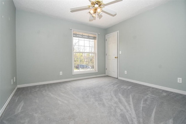 1 Hartlepool Dr, Bella Vista, AR 72715 - empty room featuring baseboards, a textured ceiling, a ceiling fan, and carpet floors