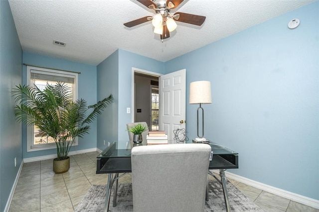 1 Hartlepool Dr, Bella Vista, AR 72715 - office area with light tile patterned floors, visible vents, a textured ceiling, and baseboards