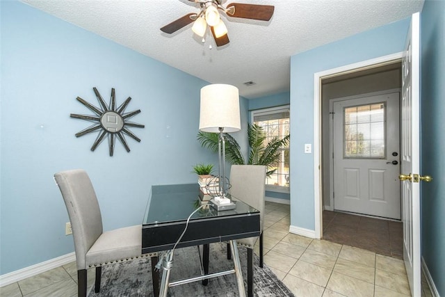 1 Hartlepool Dr, Bella Vista, AR 72715 - dining room with ceiling fan, light tile patterned floors, a textured ceiling, visible vents, and baseboards
