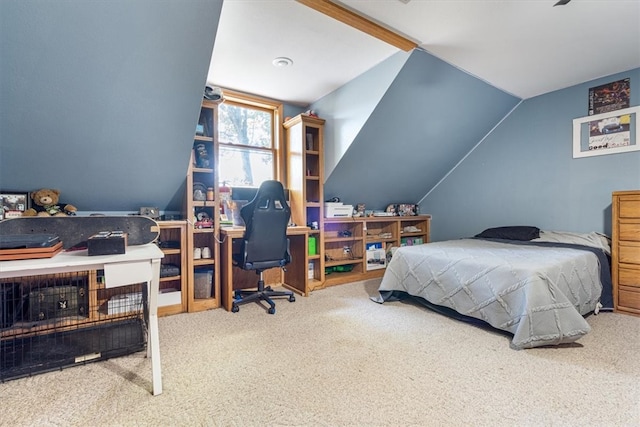 carpeted bedroom with lofted ceiling with beams