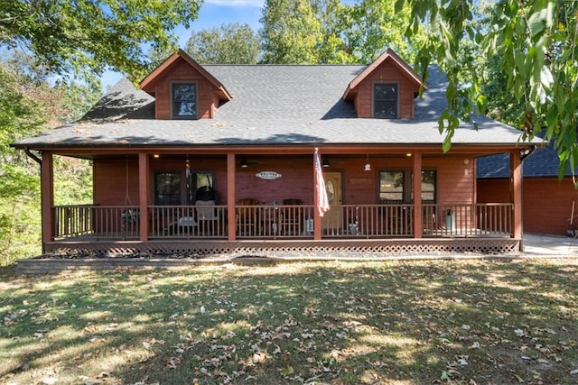 view of front facade featuring a front lawn and a porch