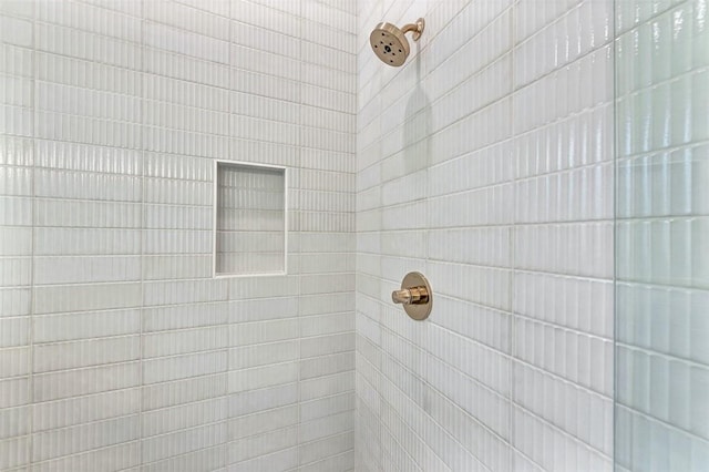 room details with a tile shower