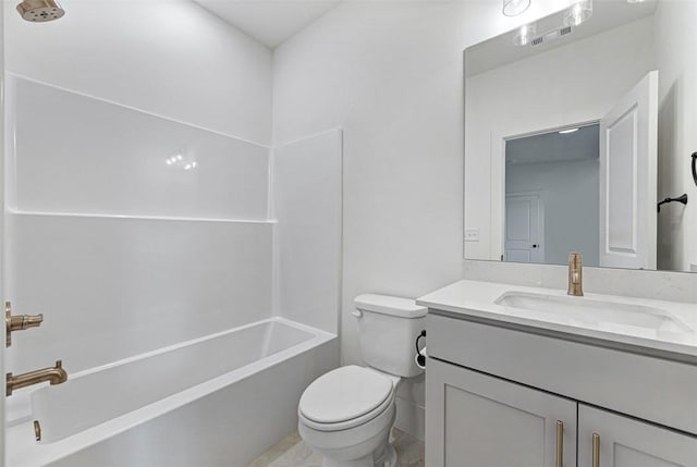 full bathroom with vanity, toilet, and washtub / shower combination