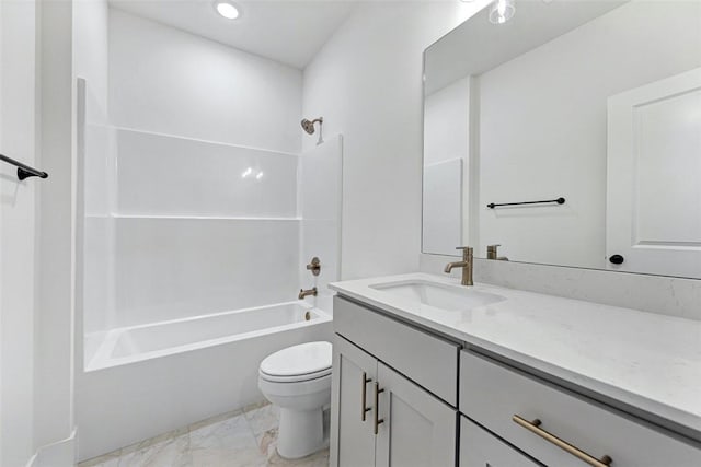 full bathroom with vanity, tub / shower combination, and toilet