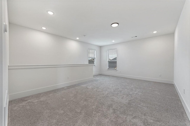 unfurnished room featuring carpet floors