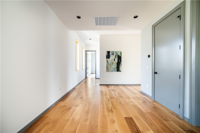 hall featuring light wood-type flooring