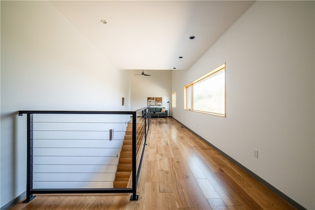 interior space with hardwood / wood-style floors and ceiling fan