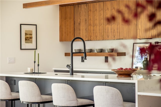 kitchen with a breakfast bar area