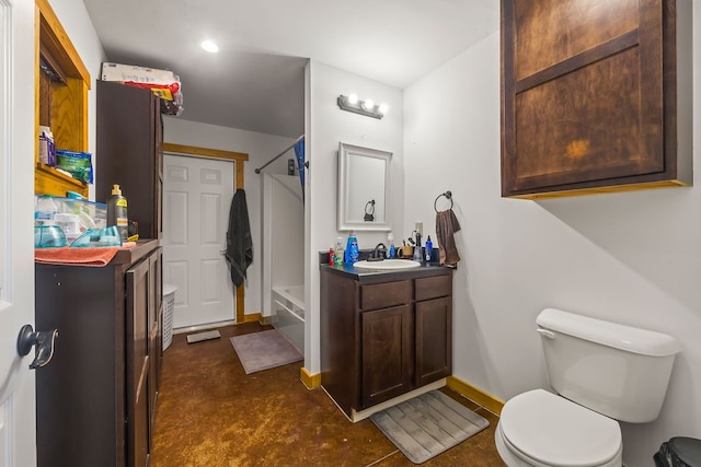 full bathroom featuring shower / bathing tub combination, vanity, and toilet