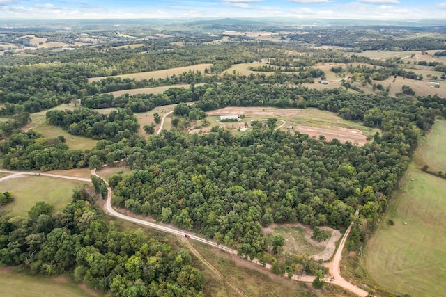 birds eye view of property featuring a rural view