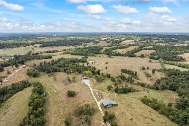 birds eye view of property featuring a rural view