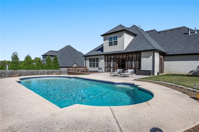 view of swimming pool with a patio area