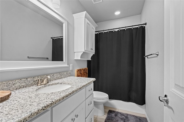 full bathroom with vanity, toilet, and shower / bathtub combination with curtain