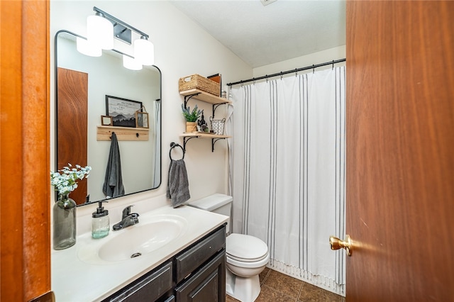 bathroom with toilet, tile patterned flooring, a shower with curtain, vanity, and a textured ceiling