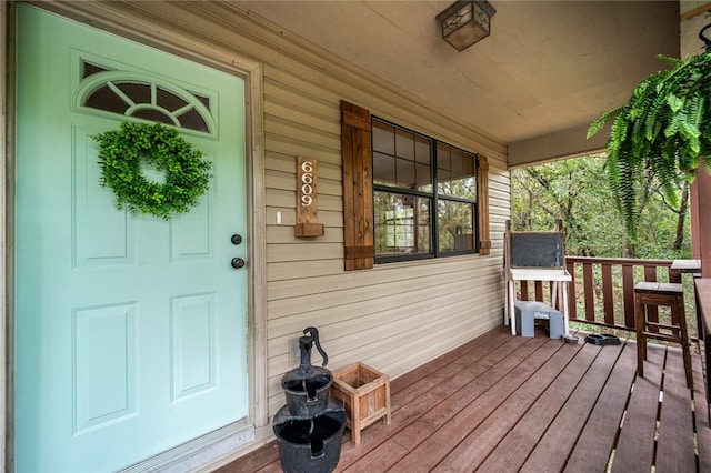 wooden terrace with covered porch