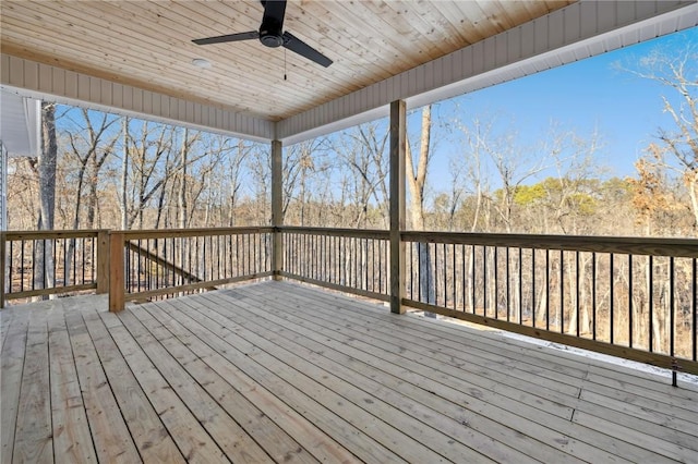 wooden deck featuring ceiling fan