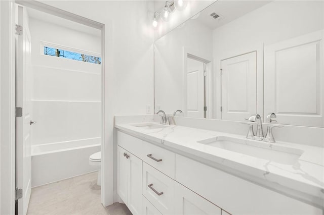 full bathroom with toilet, vanity, shower / bathing tub combination, and tile patterned floors