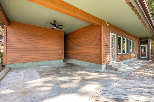 view of patio featuring a ceiling fan