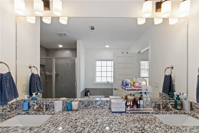 bathroom with vanity and plus walk in shower