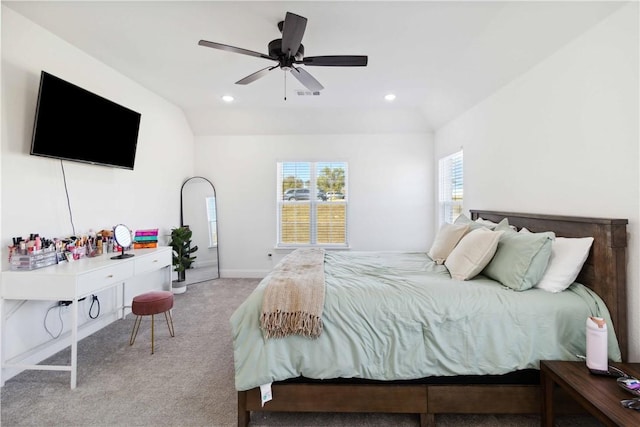 bedroom with recessed lighting, carpet, vaulted ceiling, visible vents, and a ceiling fan