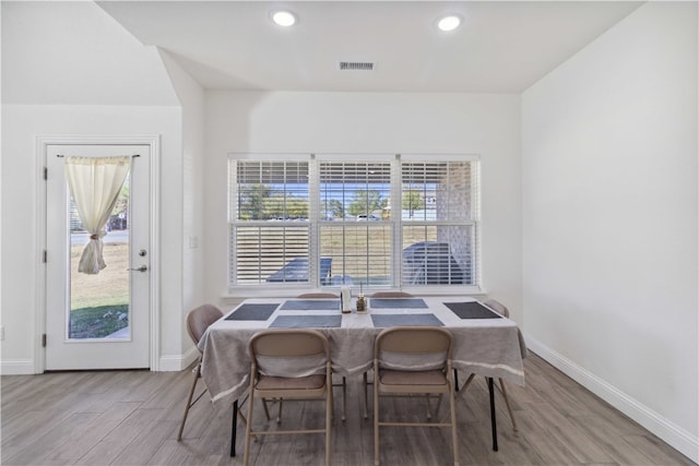 dining room featuring light hardwood / wood-style flooring